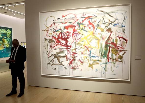 November 18, 2025, New York, New York, USA: A guard seen near Ã¢â‚¬ËœUntitledÃ¢â‚¬â ¢ 1957-1958, by artist Joan Mitchell, estimate $10 million - $15 million, seen on display at the press preview for Marquee Week Fall 2025 Modern and Comtempory Art held at Phillips Auction House New York. New York USA - ZUMAk03_ 20251118_zaf_k03_088 Copyright: xNancyxKaszermanx