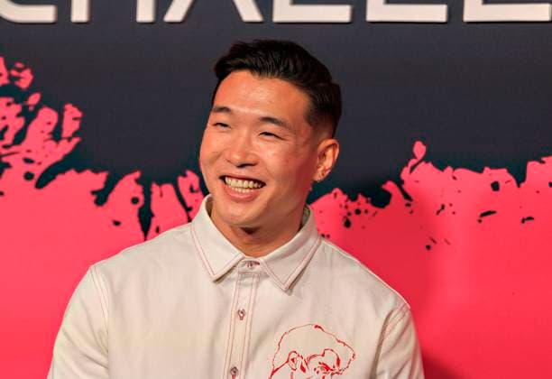 November 18, 2025, Hollywood, California, USA: Joel Kim Booster on the red carpet of the Netflix Squid Game: The Challenge Finale on Tuesday, November 18, 2025 at the Egyptian Theatre in Hollywood, California. JAVIER ROJAS PI Hollywood USA - ZUMAp124 20251118_zaa_p124_039 Copyright: xJavierxRojasx