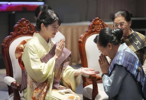 Japan Princess Aiko in Laos Japanese Princess Aiko (L) attends a traditional Lao ritual to wish for people s health and good luck in Vientiane on Nov. 18, 2025, during her official trip to Laos. (Pool photo)  A14AA0005044112P