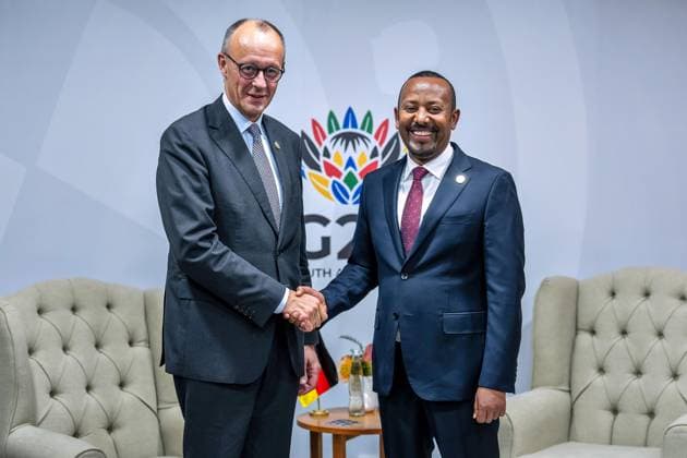 Johannesburg, Südafrika, 22.11.2025: Expo-Centre: G20-Gipfel: Bundeskanzler Friedrich Merz (CDU) und Abiy Ahmed Ali, Ministerpräsident von Äthiopien (Foto: Michael Kappeler, Pool)