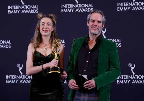 Adriana Timco (L) and Colin Barr arrive in the press room with the Best Documentary award for Hell Jumper at the 53rd International Emmy Awards at New York Hilton Midtown in New York City on Monday, November 24, 2025.  NYP20251124256 JohnxAngelillo