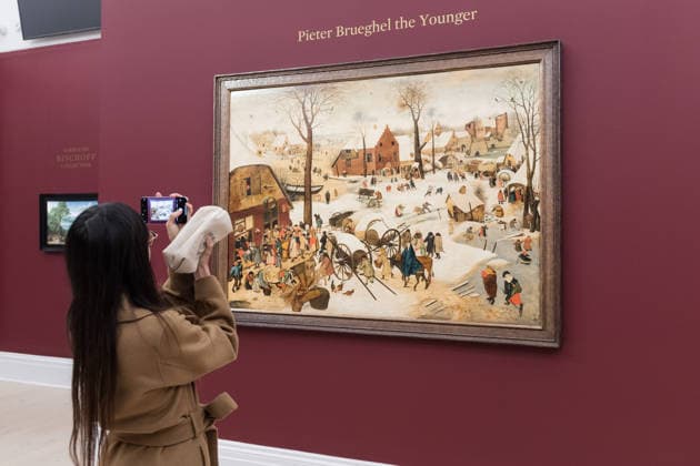 November 28, 2025, London, England, United Kingdom: A visitor takes a photo of a painting titled The Census at Bethlehem by Pieter Brueghel the Younger, estimate: 3,000,000 - 5,000,000 GBP during a photocall at Sotheby s auction house ahead of Old Master & 19th Century Paintings Sales. London United Kingdom - ZUMAs371 20251128_zip_s371_018 Copyright: xWiktorxSzymanowiczx