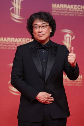 Jury President Bong Joon ho arrives on stage during the Opening Ceremony during the 22nd Marrakech International Film Festival on November 28, 2025 in Marrakech, Morocco Marrakech, Morocco 28 11 2025 451096 2025 11 28 MARRAKECH Morocco  Copyright: xRomualdxMeigneuxx xStarfacex STAR_451096_031