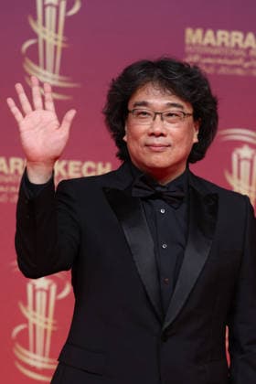 Jury President Bong Joon ho arrives on stage during the Opening Ceremony during the 22nd Marrakech International Film Festival on November 28, 2025 in Marrakech, Morocco Marrakech, Morocco 28 11 2025 451096 2025 11 28 MARRAKECH Morocco  Copyright: xRomualdxMeigneuxx xStarfacex STAR_451096_035