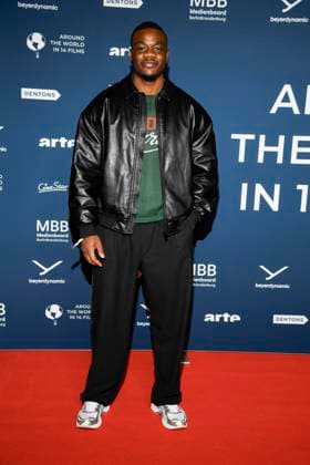 ABBberlin: Melo Nsuka zu Gast auf dem roten Teppich bei der Festival Eroeffnung AROUND THE WORLD IN 14 FILMS im Cinestar Kino in der Kulturbrauerei Berlin am 28.11.2025 Berlin Deutschland
