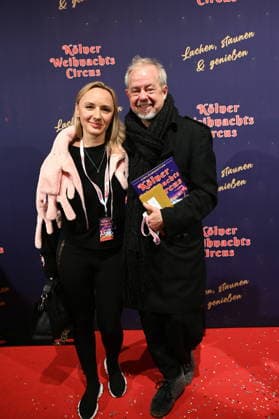 Musiker Helmut Zerlett und seine Frau Natalia kommt zur Premiere des 10. Kölner WeihnachtsCircus