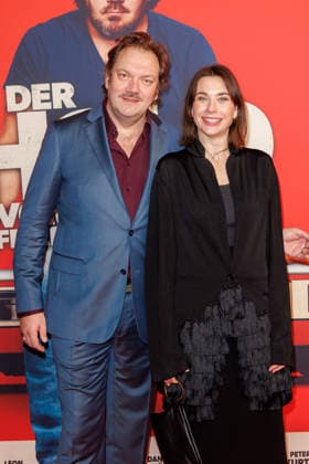 Premiere - Der Held vom Bahnhof Friedrichstrasse - Charly Hübner und Christiane Paul bei der Kinopremiere von Der Held vom Bahnhof Friedrichstrasse im Delphi-Filmpalast am 02.12.2025 in Berlin. Copyright: xEventpressxKochanx