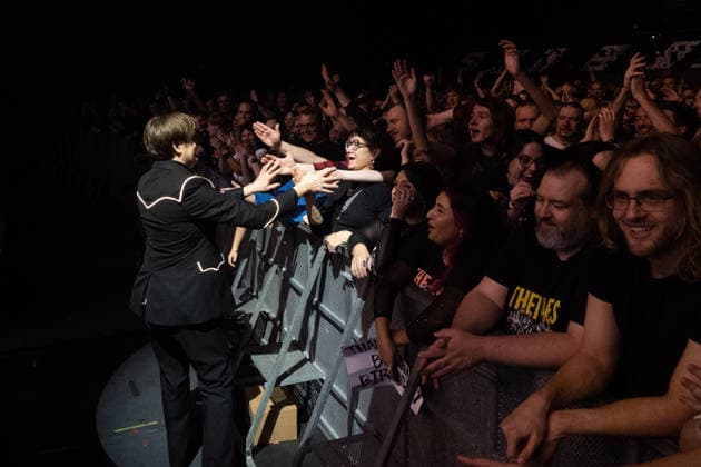 December 2, 2025, Frankfurt, Hesse, Germany: Lead singer Pelle Almqvist of the Swedish garage rock band The Hives greets the audience during a concert in Frankfurt, Germany. Frankfurt Germany - ZUMAb332 20251202_zip_b332_002 Copyright: xMatiasxBasualdox