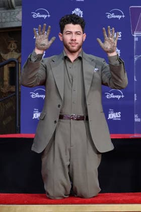 December 3, 2025, Los Angeles, California, USA: Nick Jonas at a ceremony honoring the Jonas Brothers with hand and foot prints at the TCL Chinese Theatre IMAX. Los Angeles USA - ZUMAg107 20251203_zep_g107_051 Copyright: xNinaxPrommerx