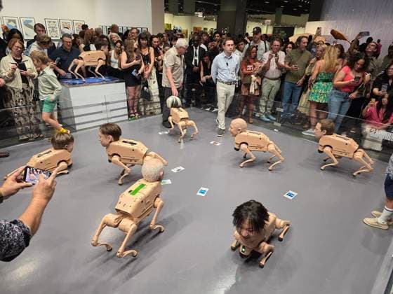 People observe the installation titled ‘Regular Animals’ at the Art Basel 2025 fair in Miami Beach, USA, 05 December 2025. American digital artist Beeple released a pack of robotic dogs with hyperrealistic heads of tech moguls and art legends such as Elon Musk, Jeff Bezos, Andy Warhol, Pablo Picasso, and Mark Zuckerberg. Robotic dogs with the faces of Musk, Bezos, and Picasso steal the show at Art Basel !ACHTUNG: NUR REDAKTIONELLE NUTZUNG!  Copyright: xAlbertoxBoalx USA6961 20251206-55018752282_1