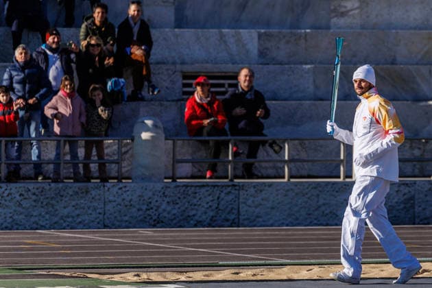 December 6, 2025, Rome, Italia, Italy: 06 12 2025 Rome, The Olympic Torch leaves Rome for the Milan Cortina 2026 Winter Olympics. In the photo, Gregorio Paltrinieri, the first torchbearer of the Milan Cortina 2026 Winter Olympics. Rome Italy  - ZUMAa289 20251206_zia_a289_036 Copyright: xFrancescoxFotiax