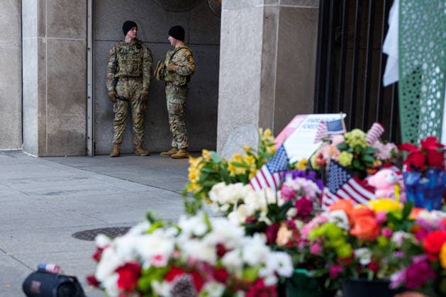 Members of the National Guard patrol near the location of a shooting that killed one National Guard member and left another in critical condition last month outside the Farragut West Metro Station in Washington DC on Sunday, December 7, 2025. A 29-year-old suspect pled not guilty to murder and assault charges earlier this week.  WAP2025120725002 AARONxSCHWARTZ