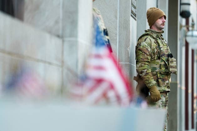 Members of the National Guard patrol near the location of a shooting that killed one National Guard member and left another in critical condition last month outside the Farragut West Metro Station in Washington DC on Sunday, December 7, 2025. A 29-year-old suspect pled not guilty to murder and assault charges earlier this week.  WAP2025120725007 AARONxSCHWARTZ