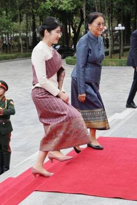 Japan Princess Aiko in Laos Japanese Princess Aiko (front), in Laotian traditional dress, is pictured with Lao Vice President Pany Yathotou at the Lao president s office in Vientiane on Nov. 18, 2025, during her official trip to Laos. (Pool photo)  A14AA0005108026P
