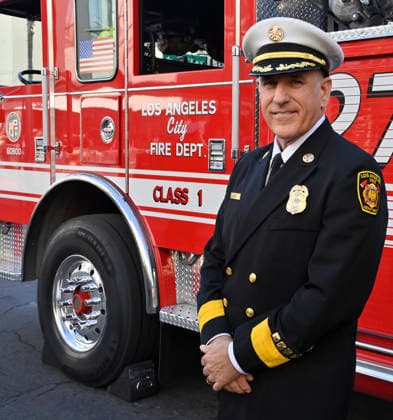 LAFD Chief Jaime E. Moore participates in an unveiling ceremony honoring the Los Angeles Fire Department with an Award of Excellence star adjacent to the Hollywood Walk of Fame in Los Angeles on Tuesday, December 2, 2025. Eniola Taiwo, 14, wrote a letter to the Hollywood Chamber of Commerce suggesting that firefighters who battled the deadly January fires were worthy of a star on the Hollywood Walk of Fame.  LAP2025121225 JIMxRUYMEN