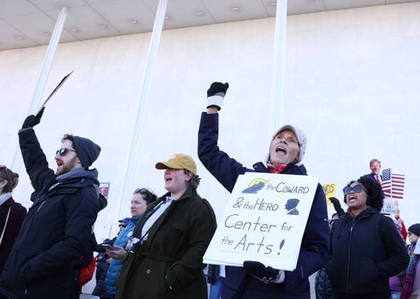 Protest against the name of Donald J. Trump to the Kennedy Center In Washington DC, USA. Demonstrators hold signs as they protest in front of the John F. Kennedy Memorial Center for the Performing Arts building, in Washington, D.C., USA, on December 20, 2025. Activists opposed adding the name Donald J. Trump to the Kennedy Center for the Performing Arts. Washington DC USA  Copyright: xMatrixxImagesx xGentxShkullakux