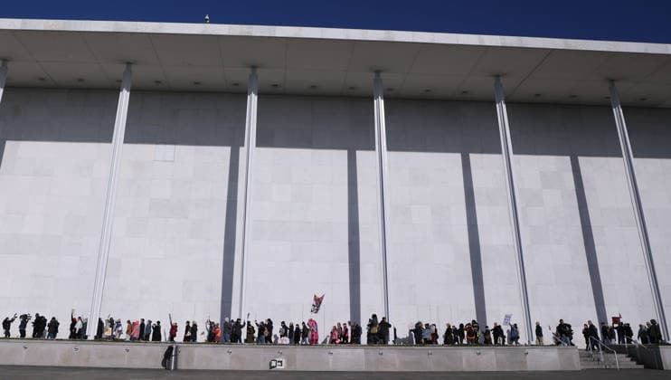 Protest against the name of Donald J. Trump to the Kennedy Center In Washington DC, USA. Demonstrators hold signs as they protest in front of the John F. Kennedy Memorial Center for the Performing Arts building, in Washington, D.C., USA, on December 20, 2025. Activists opposed adding the name Donald J. Trump to the Kennedy Center for the Performing Arts. Washington DC USA  Copyright: xMatrixxImagesx xGentxShkullakux