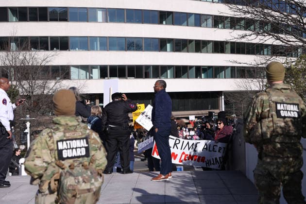 Protest against the name of Donald J. Trump to the Kennedy Center In Washington DC, USA. Security personnel and National Guard members block demonstrators from protesting in front of the John F. Kennedy Memorial Center for the Performing Arts building, in Washington, D.C., USA, on December 20, 2025. Activists opposed adding the name Donald J. Trump to the Kennedy Center for the Performing Arts. Washington DC USA  Copyright: xMatrixxImagesx xGentxShkullakux