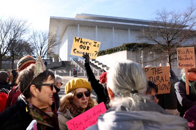 Protest against the name of Donald J. Trump to the Kennedy Center In Washington DC, USA. Demonstrators hold signs as they protest in front of the John F. Kennedy Memorial Center for the Performing Arts building, in Washington, D.C., USA, on December 20, 2025. Activists opposed adding the name Donald J. Trump to the Kennedy Center for the Performing Arts. Washington DC USA  Copyright: xMatrixxImagesx xGentxShkullakux