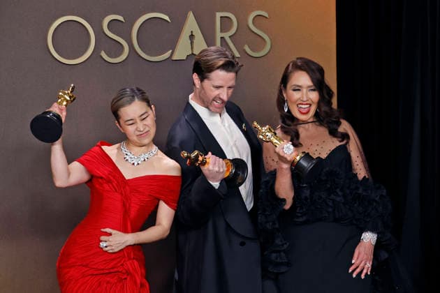 March 15, 2026, Hollywood, California, USA: (L-R) Maggie Kang, Chris Appelhans and Michelle L. M. Wong in the press room of the 98th Annual Academy Awards on Sunday March 15, 2026 at the Dolby Theater in Hollywood, California. BURT HARRIS BNS PI Hollywood USA - ZUMAp124 20260315_zaa_p124_237 Copyright: xBurtxHarrisx