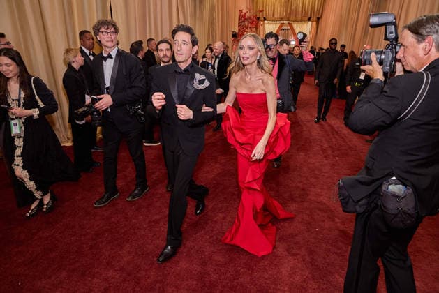 Adrien Brody and Georgina Chapman arrive on the red carpet of the 98th OscarsÂ® at the DolbyÂ® Theatre at Ovation Hollywood on Sunday, March 15, 2026. Los Angeles CA USA  350081135PLX