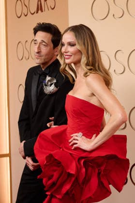 Adrien Brody and Georgina Chapman arrive on the red carpet of the 98th OscarsÂ® at the DolbyÂ® Theatre at Ovation Hollywood on Sunday, March 15, 2026. Los Angeles CA USA  350081479PLX