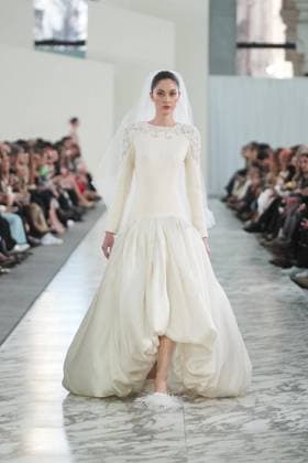 A model wears at collection runway a creation from Claro Couture during Pasarela Cibeles Mercedes-Benz Fashion Week Madrid 2026 in Madrid, on Wednesday , 18 March 2026. Cordon Press