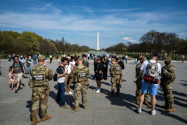 Members of the National Guard patrol near the Lincoln Memorial in Washington, DC on Tuesday, March 31, 2026. The Pentagon plans to maintain the National Guard s federal mission in Washington, DC, until Jan. 20, 2029, through the rest of President Donald Trump s second term.  WAP20260331328 BONNIExCASH