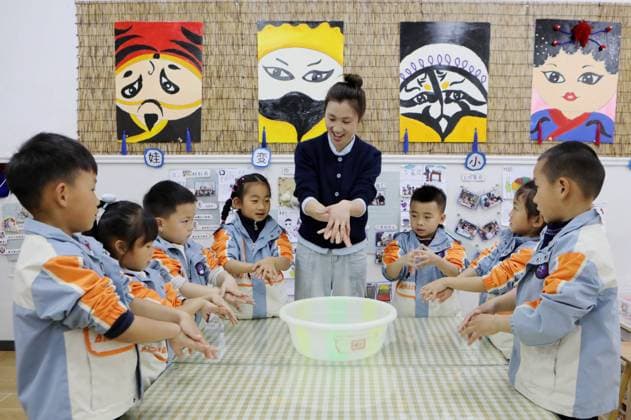 (260407) -- BEIJING, April 7, 2026 -- A teacher instructs the children in washing hands correctly at a kindergarten in Shibing County, southwest China s Guizhou Province, April 7, 2026. The World Health Day is observed annually on April 7, which marks the anniversary of the WHO s founding and raises awareness of pressing global health issues. (Photo by Xinhua) CHINA-WORLD HEALTH DAY-ACTIVITIES (CN) TaixShengzhi 