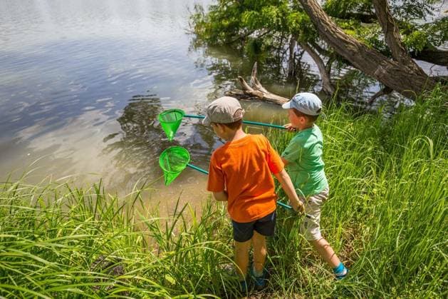 Two boys having fun with fishing nets model released Symbolfoto Copyright: xgrafvisionx Panthermedia74132528.jpg