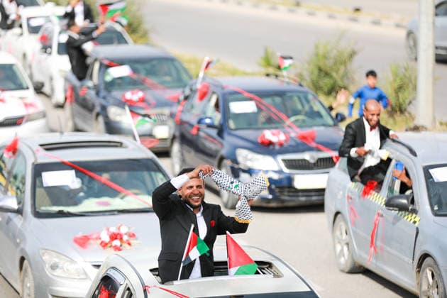 150 couples got married in a mass wedding ceremony in Deir al-Balah DEIR AL-BALAH, GAZA, PALESTINE - APRIL 24: A long wedding convoy forms during the mass wedding ceremony organized by the United Arab Emirates under the ‘Al-Fares Al-Shahem’ initiative where 150 Palestinian couples got married in Deir al-Balah, Gaza, Palestine, on April 24, 2026. Adam Bilal Anadolu Deir al-Balah Gaza. Editorial use only. Please get in touch for any other usage.  Copyright: x2026xAnadoluxAdamxBilalx