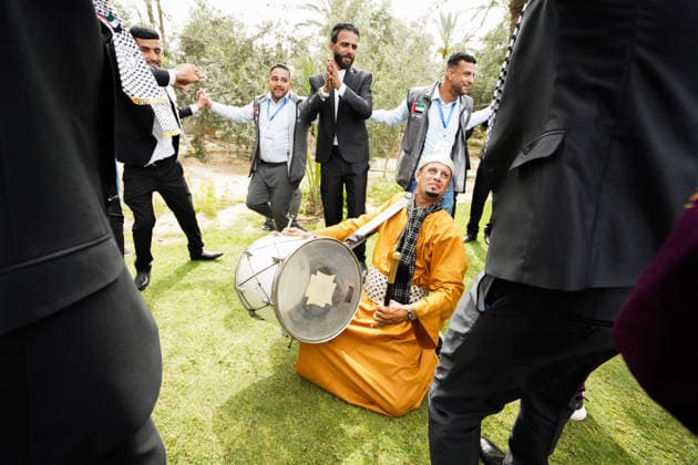 150 couples got married in a mass wedding ceremony in Deir al-Balah DEIR AL-BALAH, GAZA, PALESTINE - APRIL 24: Palestinians enjoy along with traditional music as mass wedding ceremony organized by the United Arab Emirates under the ‘Al-Fares Al-Shahem’ initiative where 150 Palestinian couples got married in Deir al-Balah, Gaza, Palestine, on April 24, 2026. Adam Bilal Anadolu Deir al-Balah Gaza. Editorial use only. Please get in touch for any other usage.  Copyright: x2026xAnadoluxAdamxBilalx