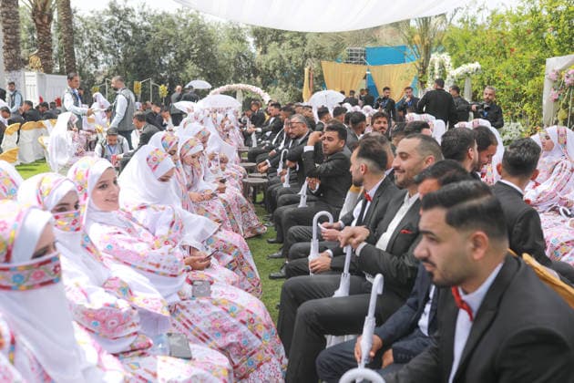 150 couples got married in a mass wedding ceremony in Deir al-Balah DEIR AL-BALAH, GAZA, PALESTINE - APRIL 24: Couples are seen as mass wedding ceremony organized by the United Arab Emirates under the ‘Al-Fares Al-Shahem’ initiative where 150 Palestinian couples got married in Deir al-Balah, Gaza, Palestine, on April 24, 2026. Adam Bilal Anadolu Deir al-Balah Gaza. Editorial use only. Please get in touch for any other usage.  Copyright: x2026xAnadoluxAdamxBilalx