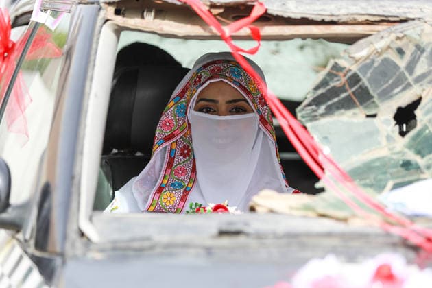 150 couples got married in a mass wedding ceremony in Deir al-Balah DEIR AL-BALAH, GAZA, PALESTINE - APRIL 24: A bride is seen as mass wedding ceremony organized by the United Arab Emirates under the ‘Al-Fares Al-Shahem’ initiative where 150 Palestinian couples got married in Deir al-Balah, Gaza, Palestine, on April 24, 2026. Adam Bilal Anadolu Deir al-Balah Gaza. Editorial use only. Please get in touch for any other usage.  Copyright: x2026xAnadoluxAdamxBilalx