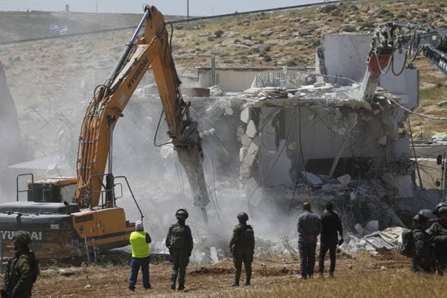 Israeli forces demolish Palestinian home in Hebron-area village Israeli army forces, accompanied by bulldozers, demolish a Palestinian home in the village of al-Deirat, east of Yatta, south of Hebron in the West Bank, on May 4, 2026. The demolition left a family, including children, displaced, as the operation was carried out under military presence that prevented residents from approaching, amid ongoing demolitions in various areas across the West Bank. Photo by Mamoun Wazwaz apaimages Hebron West Bank Palestinian Territory 040526_Hebron_MW_00(36) Copyright: xapaimagesxMamounxWazwazx xapaimagesx