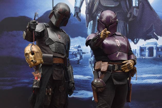 May 4, 2026, London, England, United Kingdom: Performers wearing Mandalorian costumes, one holding the severed head of C-3PO, stand outside the Disney store on Oxford Street on Star Wars Day. The beloved sci-fi franchise is celebrated each year on May 4th, a pun on the famous phrase May The Force Be With You. London United Kingdom - ZUMAv130 20260504_zip_v130_006 Copyright: xVukxValcicx