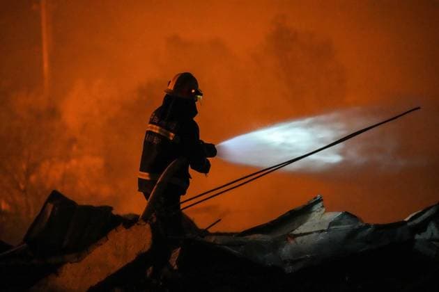 (260505) -- CHANGSHA, May 5, 2026 -- A rescuer works on site after an explosion at a fireworks plant in Guandu Town of Liuyang, central China s Hunan Province, May 5, 2026. Three people were killed, and 25 others were injured, including two in serious condition, after an explosion hit a fireworks plant in central China s Hunan Province on Monday, according to a local emergency management bureau. The explosion occurred at around 4:43 p.m. at the plant in Liuyang, a county-level city under Changsha, capital city of Hunan. After the accident, local emergency and fire rescue forces rushed to the scene to carry out rescue operations, which are still underway. ) (SpotNews) CHINA-HUNAN-LIUYANG-FIREWORKS PLANT-EXPLOSION (CN) ChenxSihan