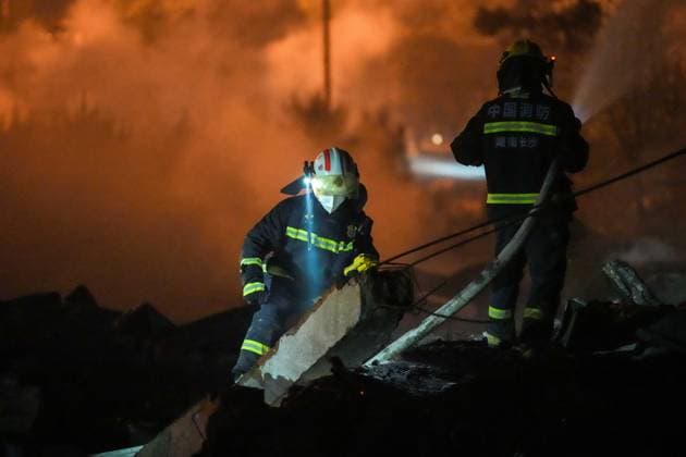 (260505) -- CHANGSHA, May 5, 2026 -- Rescuers work on site after an explosion at a fireworks plant in Guandu Town of Liuyang, central China s Hunan Province, May 5, 2026. Three people were killed, and 25 others were injured, including two in serious condition, after an explosion hit a fireworks plant in central China s Hunan Province on Monday, according to a local emergency management bureau. The explosion occurred at around 4:43 p.m. at the plant in Liuyang, a county-level city under Changsha, capital city of Hunan. After the accident, local emergency and fire rescue forces rushed to the scene to carry out rescue operations, which are still underway. ) (SpotNews) CHINA-HUNAN-LIUYANG-FIREWORKS PLANT-EXPLOSION (CN) ChenxSihan