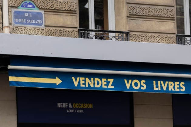 Paris, France May 4, 2026 - People walk past the Gibert Joseph bookstore on Boulevard Saint-Michel. The legendary bookstore in the Latin Quarter announced on April 28 that it had filed for bankruptcy protection. Facing financial difficulties, it is seeking to adapt its business model, at a time when one in five books purchased in France is secondhand. ECONOMIE, LIBRAIRIE GIBERT JOSEPH, ILLUSTRATION, GENERIQUE, RIVE GAUCHE, LIVRES, BANQUEROUTE, DIFFICULTES FINANCIERE, ENSEIGNE, LIBRAIRE, LECTURE, LIRE, REDRESSEMENT JUDICIAIRE, LECTEURS, LIVRES NEUFS, LIVRES D OCCASION, LIBRAIRIE INDEPENDANTE, COMMERCE EN LIGNE, ECOMMERCE Copyright: xVincentxIsorex