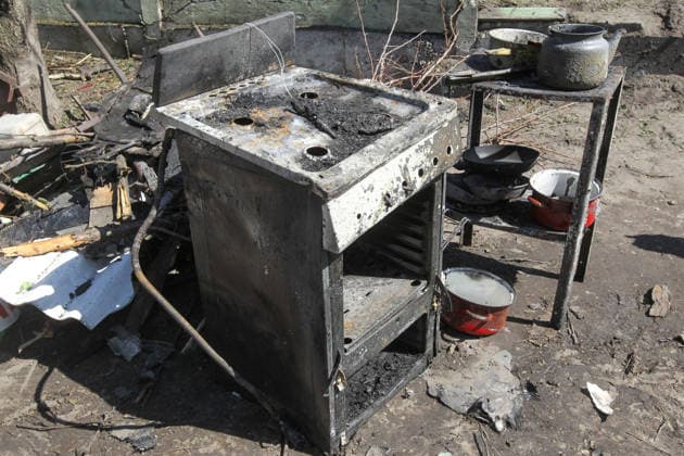 A burnt-out stove is in the yard of a house affected by a Russian drone strike in Dnipro, Ukraine, May 5, 2026. As a result of the attack, one person was injured. Three private houses and a critical infrastructure facility were also damaged in the city. (Photo by Mykola Miakshykov Ukrinform) Russian drone strike hits residential area in Dnipro  Copyright: xMykolaxMiakshykovx