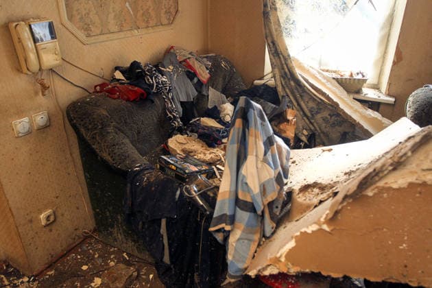 Rubble covers the floor and furniture in the living room of a house damaged by a Russian drone strike in Dnipro, Ukraine, May 5, 2026. As a result of the attack, one person was injured. Three private houses and a critical infrastructure facility were also damaged in the city. (Photo by Mykola Miakshykov Ukrinform) Russian drone strike hits residential area in Dnipro  Copyright: xMykolaxMiakshykovx