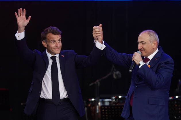 ARMENIA, GYUMRI - MAY 5, 2026: Emmanuel Macron (L), President of France, and Nikol Pashinyan, Prime Minister of Armenia, appear on stage during a concert titled Musical Bridge: Armenia - France and held in Vardanants Square to mark friendship between the two countries. Alexander Patrin TASS  92082954