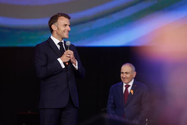 ARMENIA, GYUMRI - MAY 5, 2026: Emmanuel Macron (L), President of France, and Nikol Pashinyan, Prime Minister of Armenia, appear on stage during a concert titled Musical Bridge: Armenia - France and held in Vardanants Square to mark friendship between the two countries Gyumri Armenia  - ZUMAt113 20260505_zaa_t113_353 Copyright: xAlexanderxPatrinx