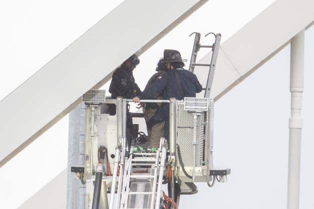 May 6, 2026, Washington, District Of Columbia, USA: Metropolitan Police Department officers stage beneath the Frederick Douglass Memorial Bridge as they await protester GUIDO REICHSTADTER to come down after occupying the bridge for several days. Washington USA - ZUMAk206 20260506_znp_k206_010 Copyright: xMattxKaminskyx