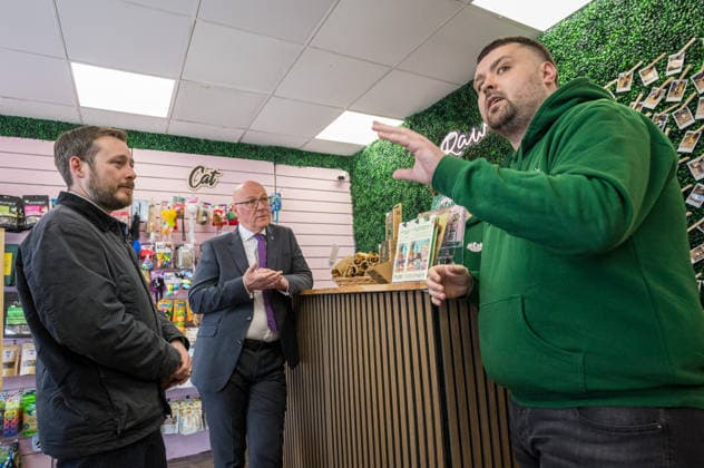 First Minister of Scotland John Swinney joins SNP candidate Alex Kerr campaigning in Hamilton - 06 May 2026 First Minister of Scotland John Swinney (centre) and SNP candidate Alex Kerr (left) visit a local pet food store while campaigning in the constituency. The day before the Scottish parliamentary elections, First Minister of Scotland John Swinney visits Hamilton in South Lanarkshire, the constituency of SNP candidate Alex Kerr to kick off the final day of campaigning by meeting potential voters and owners of local businesses. Hamilton United Kingdom Copyright: xNeilxMiltonx xSOPAxImagesx L1000995