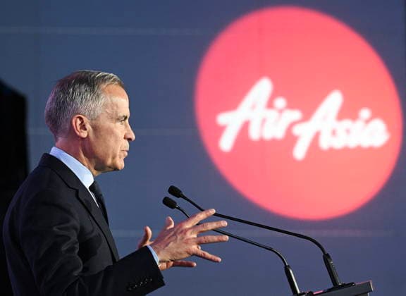 May 6, 2026, Mirabel, Pq, Canada: Prime Minister Mark Carney speaks during an event at the Airbus A220 Delivery Center in Mirabel, Que., Wednesday, May 6, 2026, where AirAsia placed a landmark order for 150 Airbus A220 aircraft. Mirabel Canada  - ZUMAc35_ 20260506_zaf_c35_174 Copyright: xGrahamxHughesx