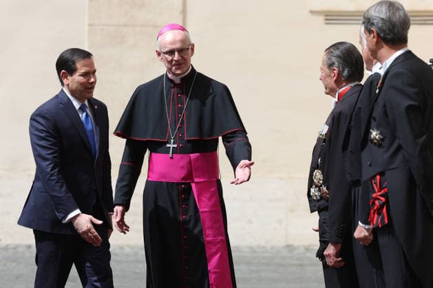 Vatican City, May 7, 2026: U.S. Secretary of State Marco Rubio and his wife, Jeanette Dousdebes Rubio, arrive in the San Damaso Courtyard, where they were received by Apostolic Nuncio Petar Rajic for an official meeting with Pope Leo XIV and Cardinal Pietro Parolin. The visit takes place in a particularly delicate diplomatic climate, following Donald Trump s recent statements against the Pontiff, which have attracted the attention of the international community and global media. The meeting thus takes on strong symbolic and institutional significance, focusing on the dialogue between the Holy See and the United States, geopolitical tensions, and the role of Vatican diplomacy in the contemporary landscape. Copyright: xmarcoxiacobuccix xipa-agency.netx xmarcoxiacobuccix IPA_Agency_IPA74485803