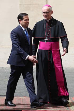 Vatican City, May 7, 2026: U.S. Secretary of State Marco Rubio and his wife, Jeanette Dousdebes Rubio, arrive in the San Damaso Courtyard, where they were received by Apostolic Nuncio Petar Rajic for an official meeting with Pope Leo XIV and Cardinal Pietro Parolin. The visit takes place in a particularly delicate diplomatic climate, following Donald Trump s recent statements against the Pontiff, which have attracted the attention of the international community and global media. The meeting thus takes on strong symbolic and institutional significance, focusing on the dialogue between the Holy See and the United States, geopolitical tensions, and the role of Vatican diplomacy in the contemporary landscape. Copyright: xmarcoxiacobuccix xipa-agency.netx xmarcoxiacobuccix IPA_Agency_IPA74485806