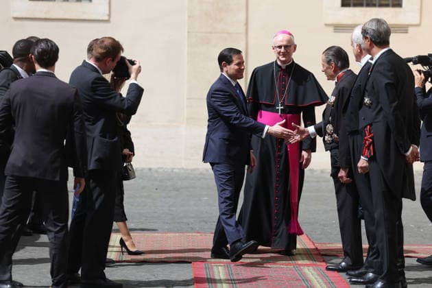 Vatican City, May 7, 2026: U.S. Secretary of State Marco Rubio and his wife, Jeanette Dousdebes Rubio, arrive in the San Damaso Courtyard, where they were received by Apostolic Nuncio Petar Rajic for an official meeting with Pope Leo XIV and Cardinal Pietro Parolin. The visit takes place in a particularly delicate diplomatic climate, following Donald Trump s recent statements against the Pontiff, which have attracted the attention of the international community and global media. The meeting thus takes on strong symbolic and institutional significance, focusing on the dialogue between the Holy See and the United States, geopolitical tensions, and the role of Vatican diplomacy in the contemporary landscape. Copyright: xmarcoxiacobuccix xipa-agency.netx xmarcoxiacobuccix IPA_Agency_IPA74485807