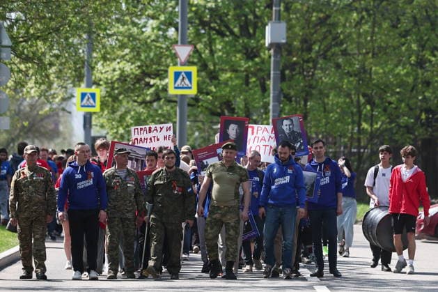 RUSSIA, MOSCOW - MAY 7, 2026: People take part in an event titled You Cannot Cancel Truth and Memory! outside the German Embassy in Moscow. Sofya Sandurskaya TASS  92136505